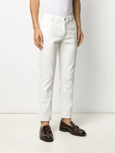 Shop Brunello Cucinelli Slim-fit Trousers In White