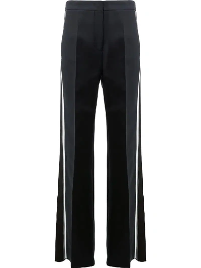 Shop Fendi Side Stripe Flared Trousers In Black