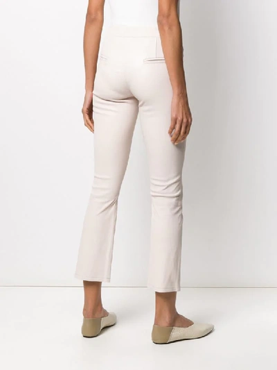 Shop Arma Cropped Flared Trousers In Neutrals