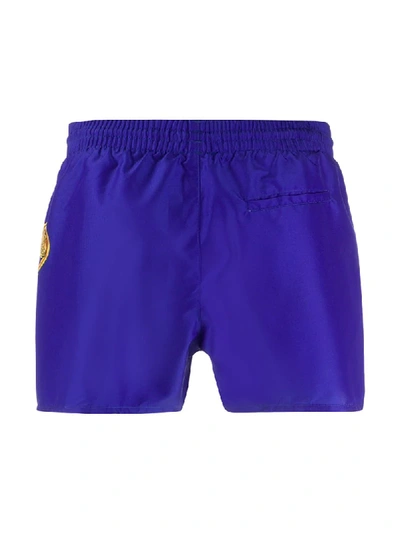 Shop Versace Logo Print Swim Shorts In Blue
