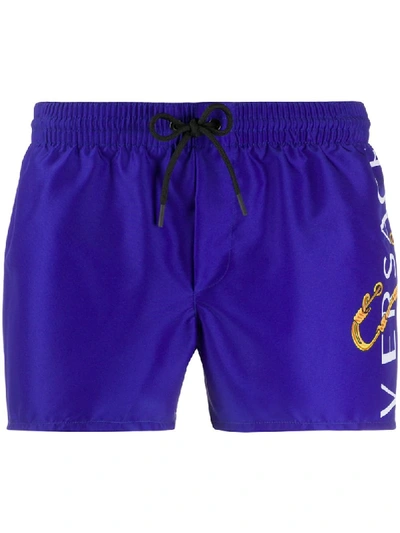 Shop Versace Logo Print Swim Shorts In Blue