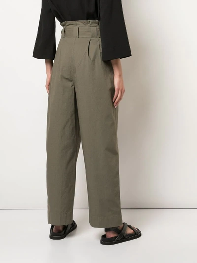Shop Ganni D-ring Belted Trousers In Kalamata