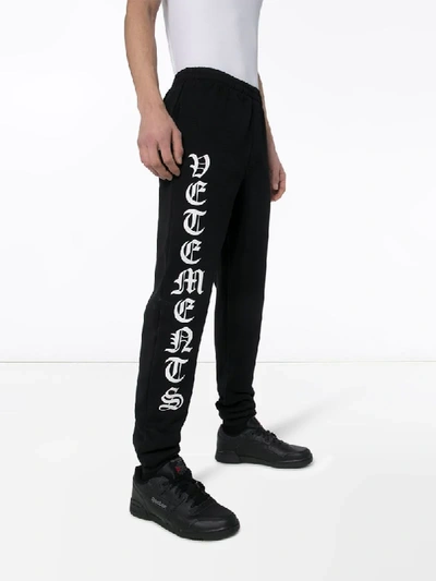 Shop Vetements Logo-print Track Pants In Black