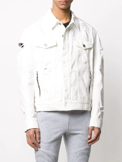 Shop Balmain Distressed Logo Print Denim Jacket In White
