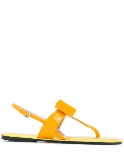 Shop Pollini Bow Detail Flat Sandals In Yellow