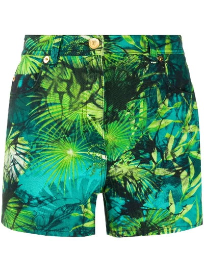 Shop Versace Jungle Print Denim Shorts In Green