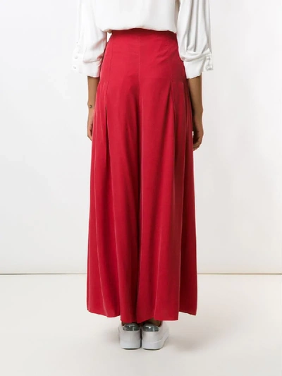 Shop Alcaçuz Rhyno Palazzo Trousers In Red