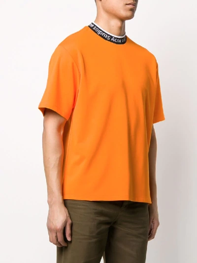 Shop Acne Studios Logo Neck T-shirt In Orange