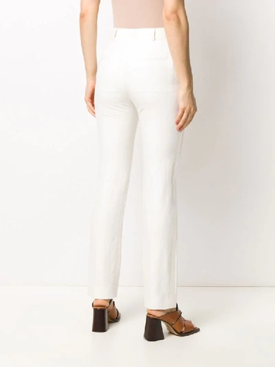 Shop Haider Ackermann High-waisted Tapered Trousers In White