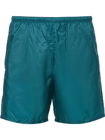 Shop Prada Triangle Logo Swim Shorts In Blue