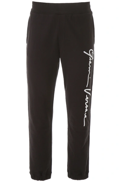 Shop Versace Signature Sweatpants In Nero (black)