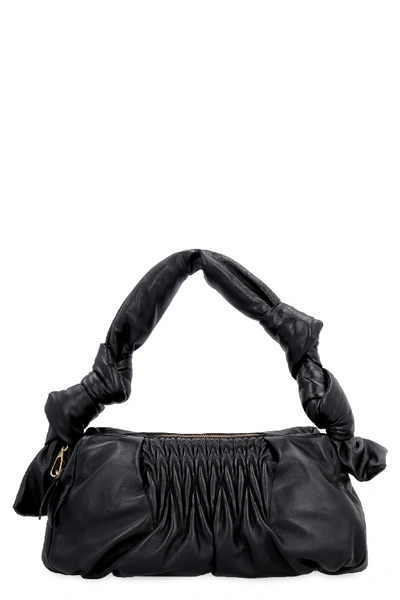 Shop Miu Miu Quilted Leather Bag In Black