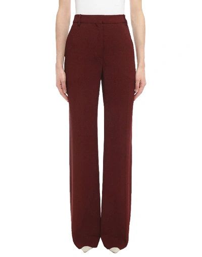 Shop Valentino Casual Pants In Maroon
