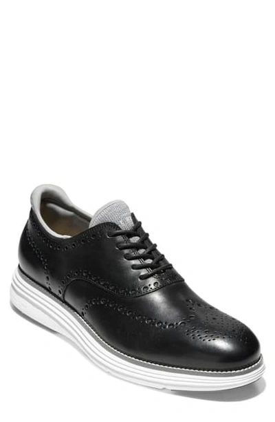 Shop Cole Haan Original Grand Ultra Wingtip In Black Leather/ Optic White