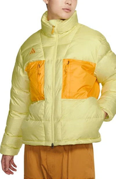 Shop Nike Acg Water Repellent Nylon Down Jacket In Luminous Green/ Gold