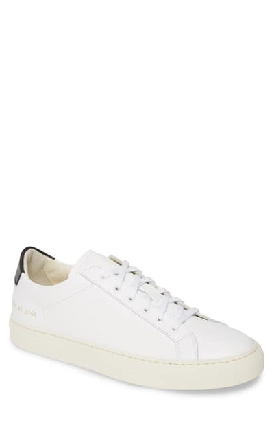 Shop Common Projects Retro Low Top Sneaker In White/black