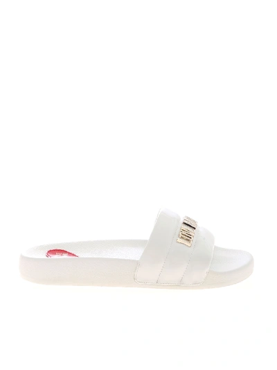 Shop Love Moschino Metal Logo Slippers In White