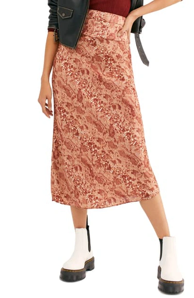 Shop Free People Normani Leopard Print Bias Cut Midi Skirt In Desert Peach Combo