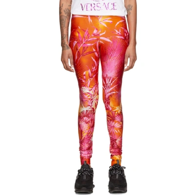 Shop Versace Orange Jungle Leggings In A7010 Pink
