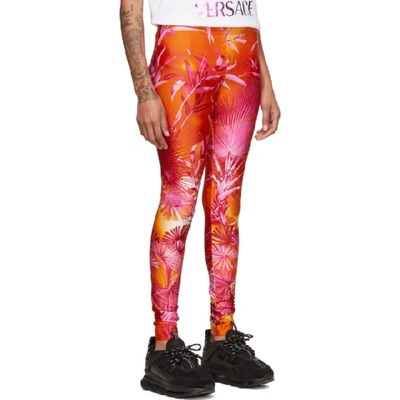 Shop Versace Orange Jungle Leggings In A7010 Pink