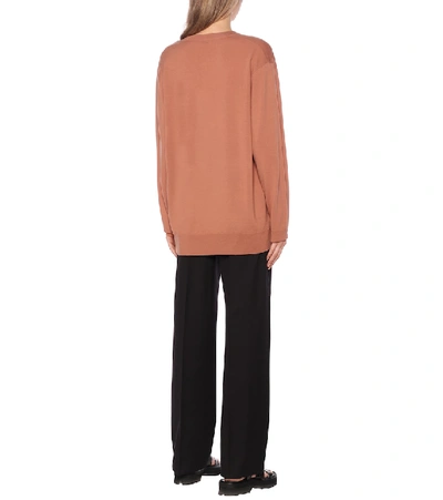 Shop Dries Van Noten Merino Wool V-neck Sweater In Pink