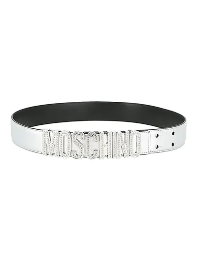Shop Moschino Embellished Logo Metallic Leather Belt In Nichel Metal