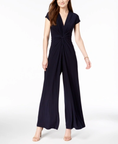 Shop Vince Camuto Petite Plunging Twist-front Jumpsuit In Navy