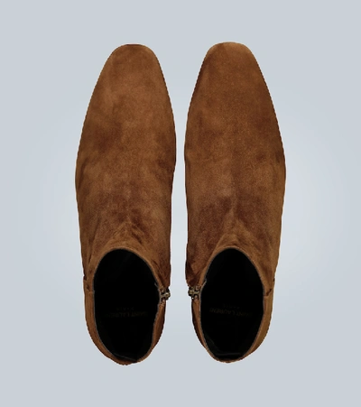 Shop Saint Laurent Caleb Zipped Boots In Brown