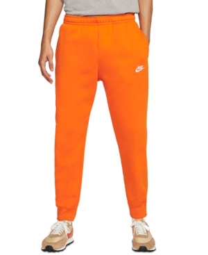 orange nike track pants