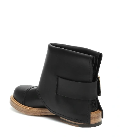 Shop Alexander Mcqueen Cuff Leather Ankle Boots In Black