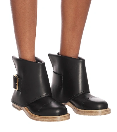 Shop Alexander Mcqueen Cuff Leather Ankle Boots In Black