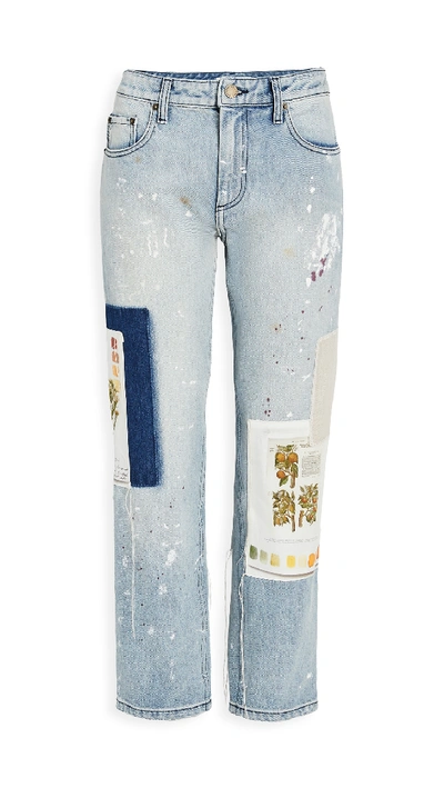 Shop Monse Paint Splatter Botanical Patch Jeans In Indigo