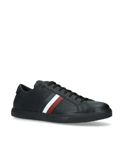 Shop Moncler Leather Monaco Sneakers