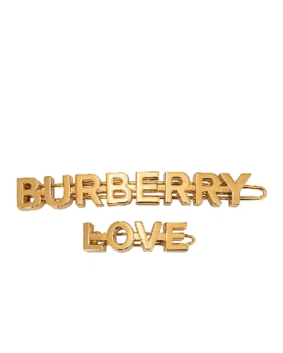 Shop Burberry Love B Hair Clips In Light Gold