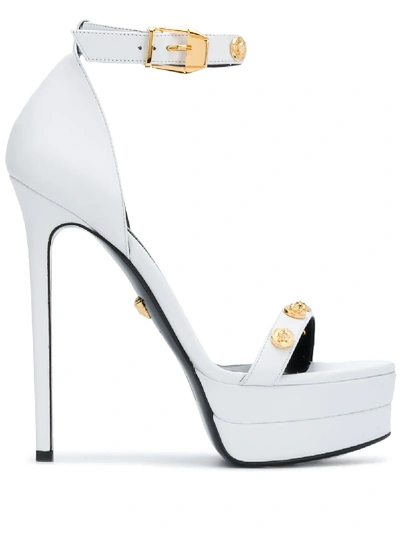 Shop Versace Studded Sandals In White