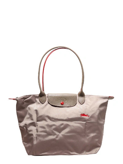 Shop Longchamp Le Pliage Handbag In Visone