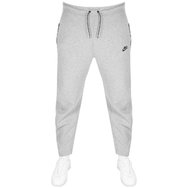 nike tech jogging bottoms