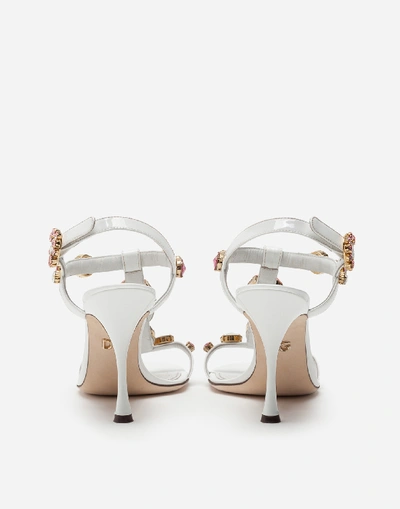 Shop Dolce & Gabbana Patent Leather T-strap Sandals With Stone Embroidery In White