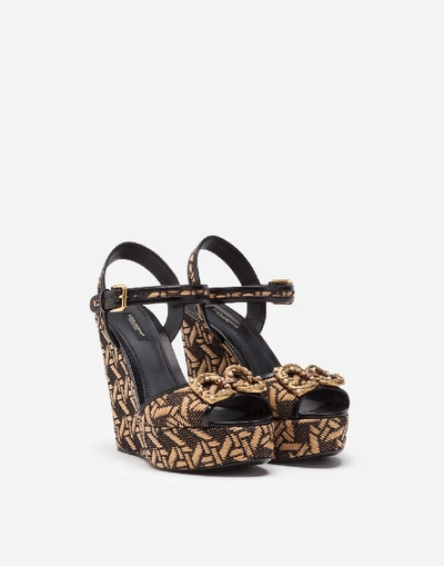 Shop Dolce & Gabbana Braided Raffia Wedge Sandals With Dg Amore Logo In Beige/black