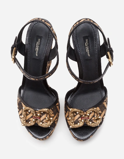 Shop Dolce & Gabbana Braided Raffia Wedge Sandals With Dg Amore Logo In Beige/black