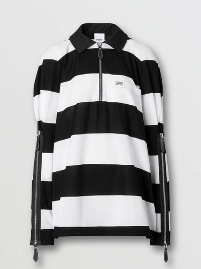 Shop Burberry Zip Detail Striped Cotton Piqué Oversized Rugby Shirt In Black/white