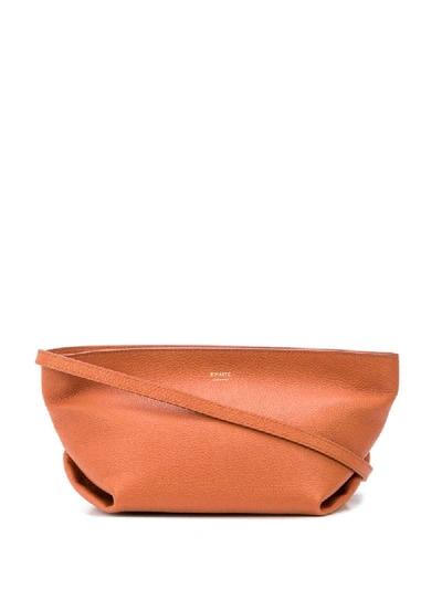 Shop Khaite Adeline Crossbody Bag In Orange