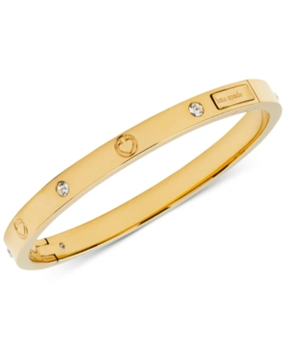 Shop Kate Spade Cubic Zircona & Engraved Spade Bangle Bracelet In Gold