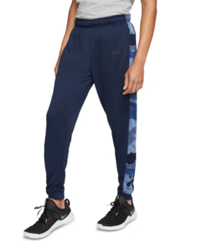 Shop Nike Men's Dri-fit Camo-trim Fleece Tapered Pants In Obsidian/blue