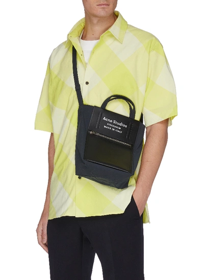Shop Acne Studios Logo Zip Pocket Leather Panelled Small Tote Bag