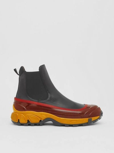 Shop Burberry Contrast Sole Leather Chelsea Boots In Black