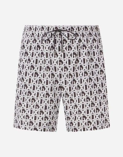 Shop Dolce & Gabbana Medium Swimming Trunks With Dg Net Print In Black