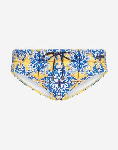 Shop Dolce & Gabbana Swimming Briefs With Maiolica Print On A Yellow Background