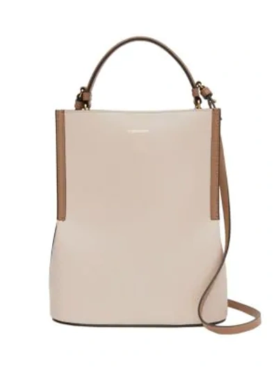 Shop Burberry Small Peggy Leather Bucket Bag In Buttermilk