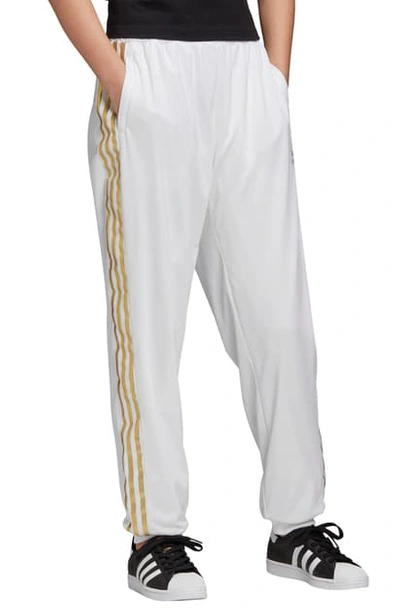 Shop Adidas Originals Sst 2.0 Track Pants In White
